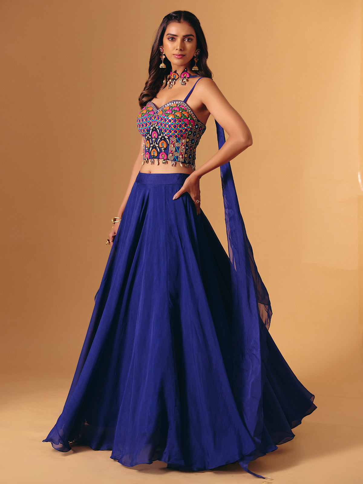 Blue georgette lehenga choli with cowrie shell