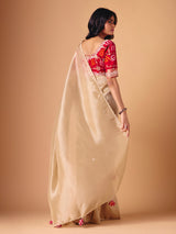 Beige tissue silk reception wear saree