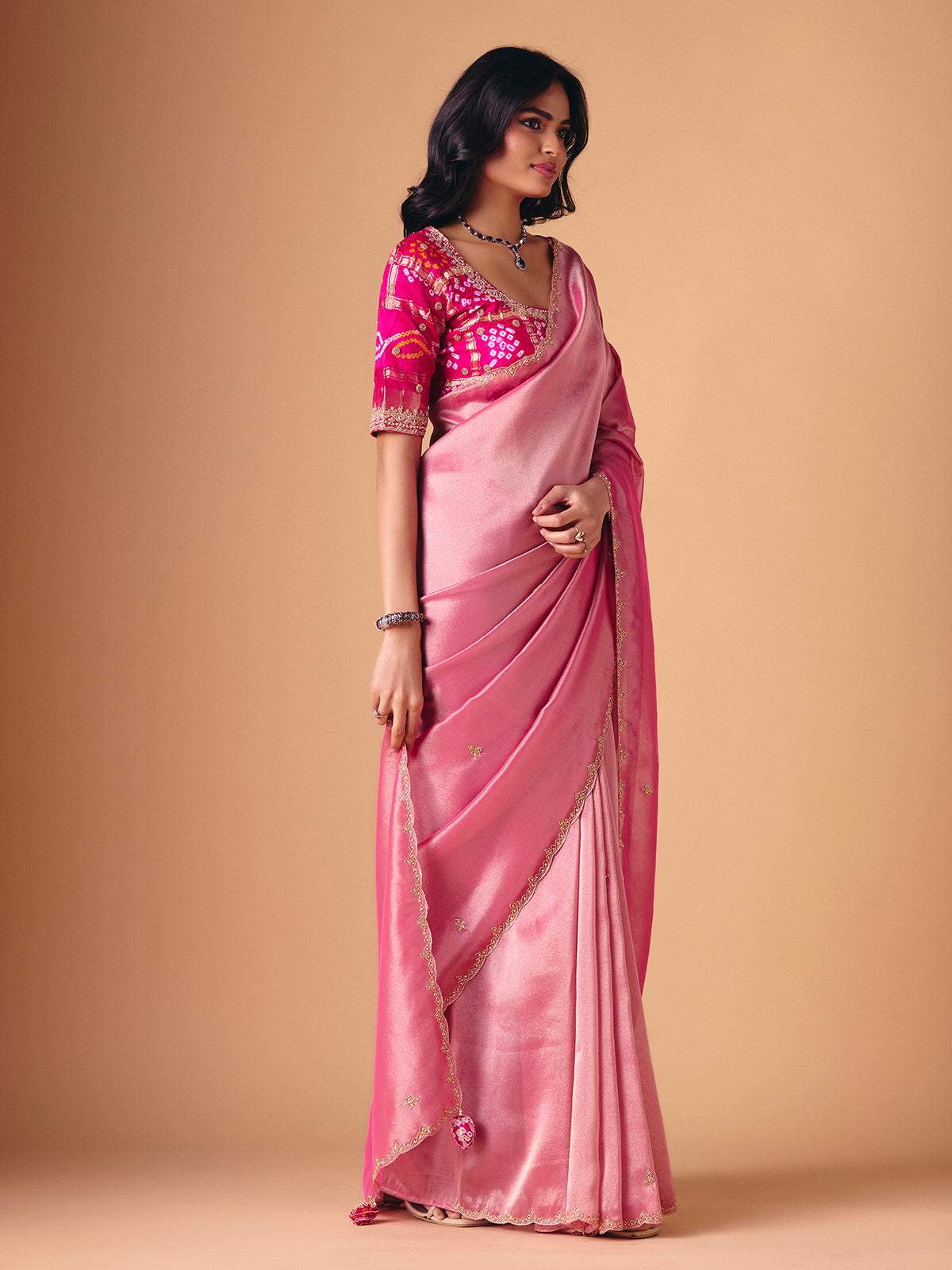 Pink tissue silk designer saree for reception