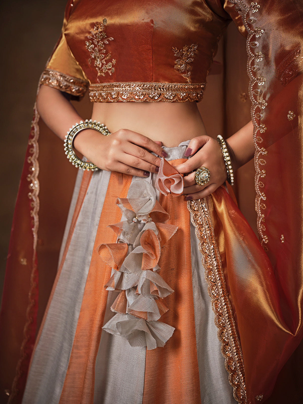 Rust orange tissue silk lehenga choli for women