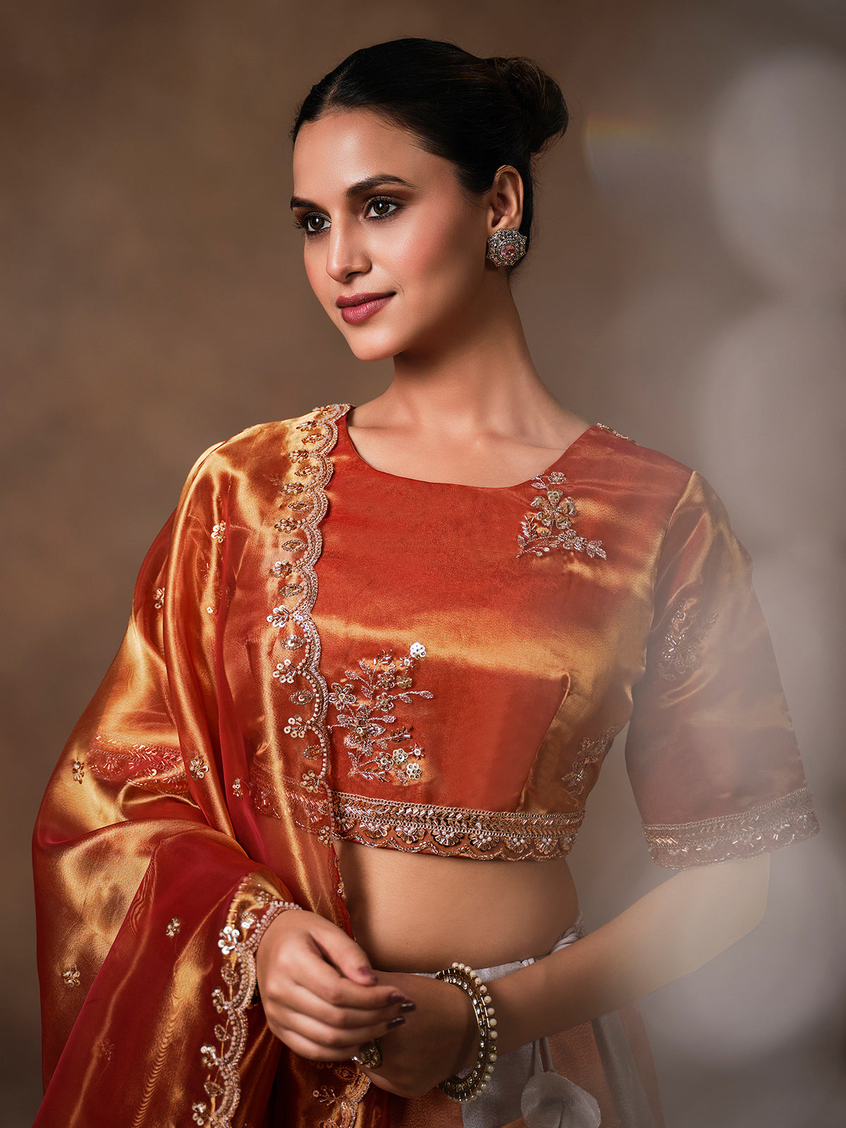 Rust orange tissue silk lehenga choli for women