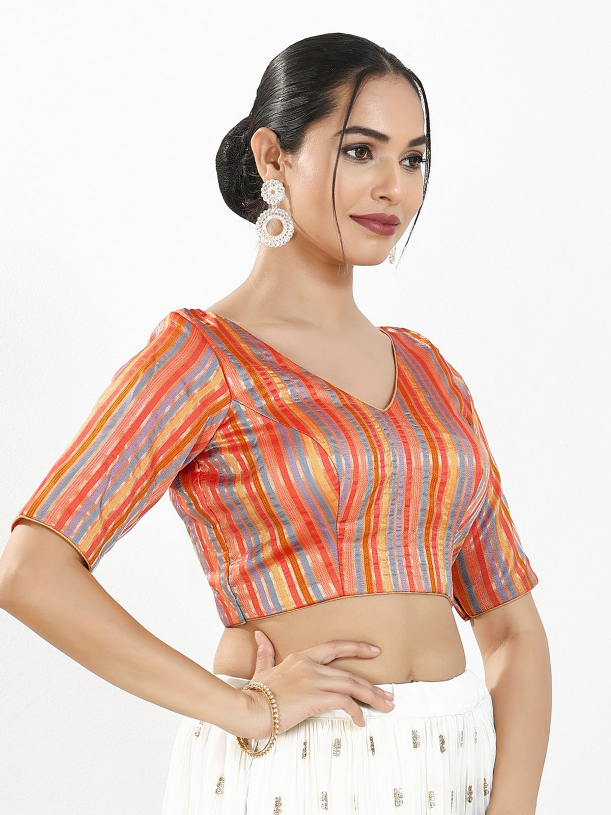 Orange multi stripe brocade V neck blouse