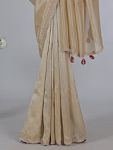 Beige tissue silk heavy embellished saree