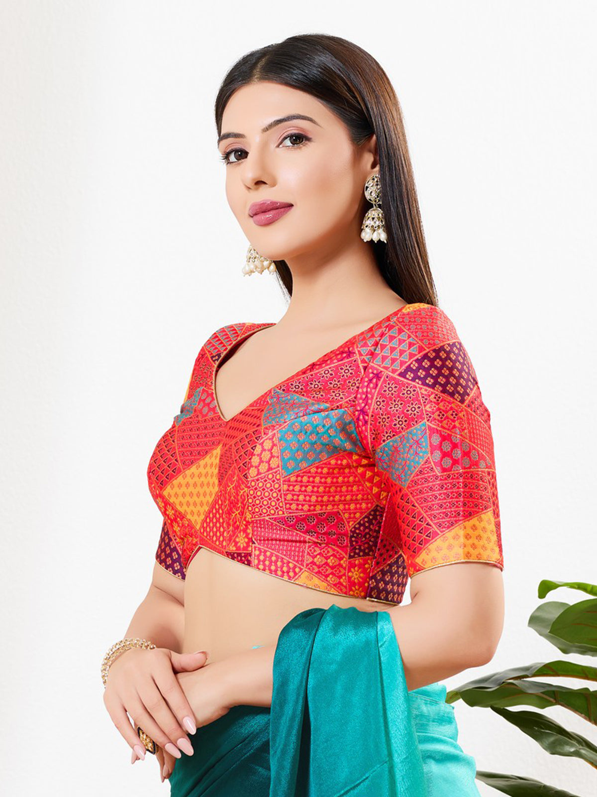 Red printed brocade V neck blouse