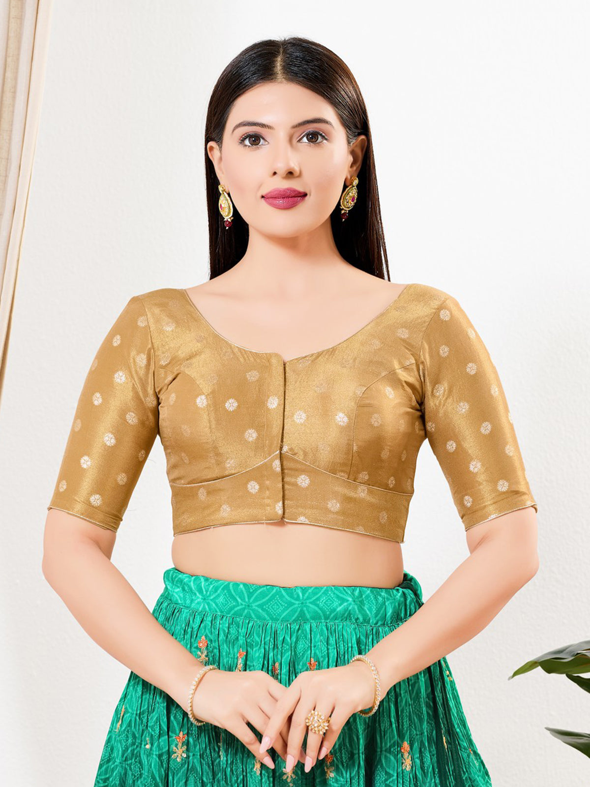 Light gold tissue sleeveless V neck blouse