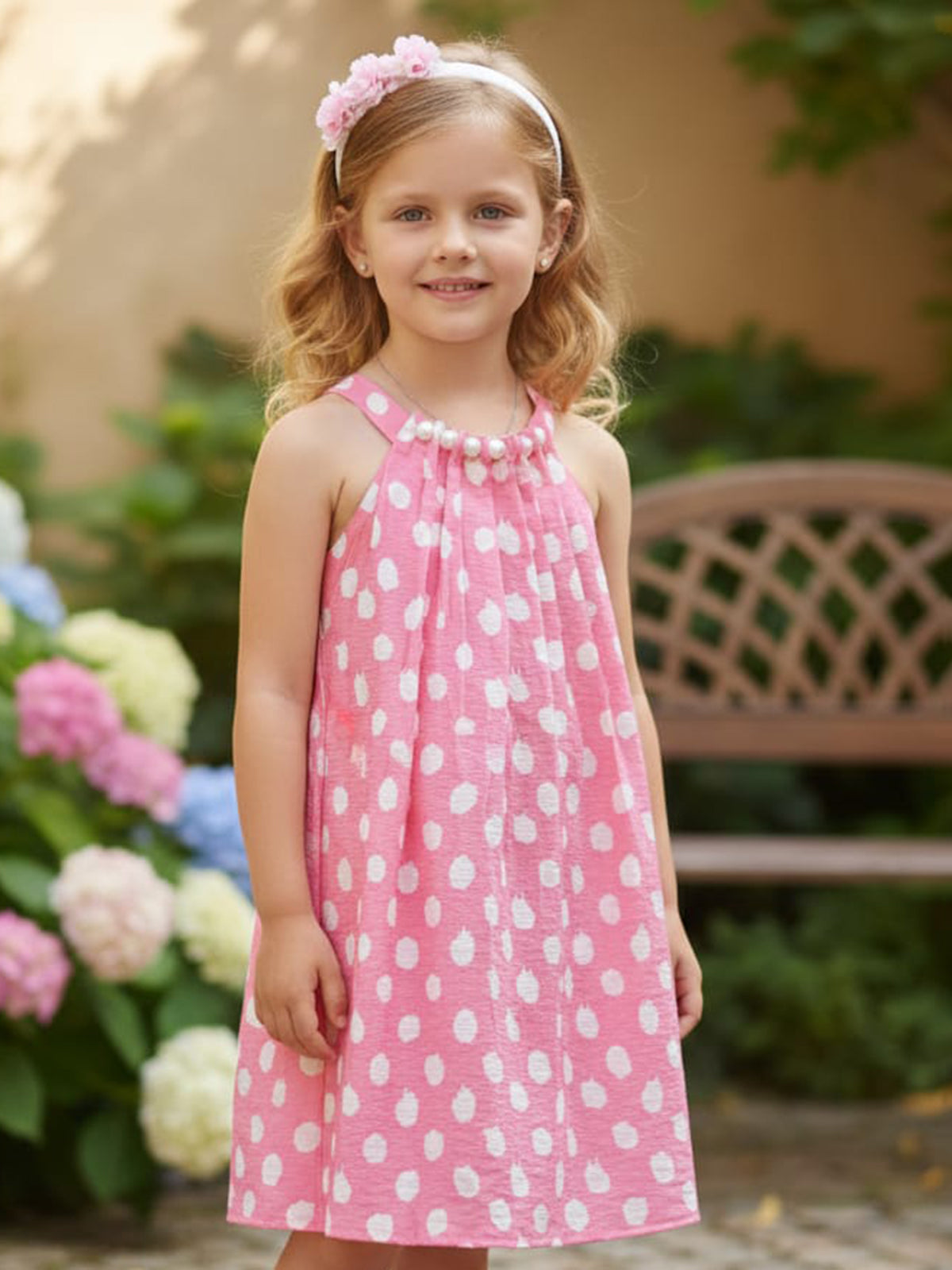 Light pink printed silk frock with pearl highlights