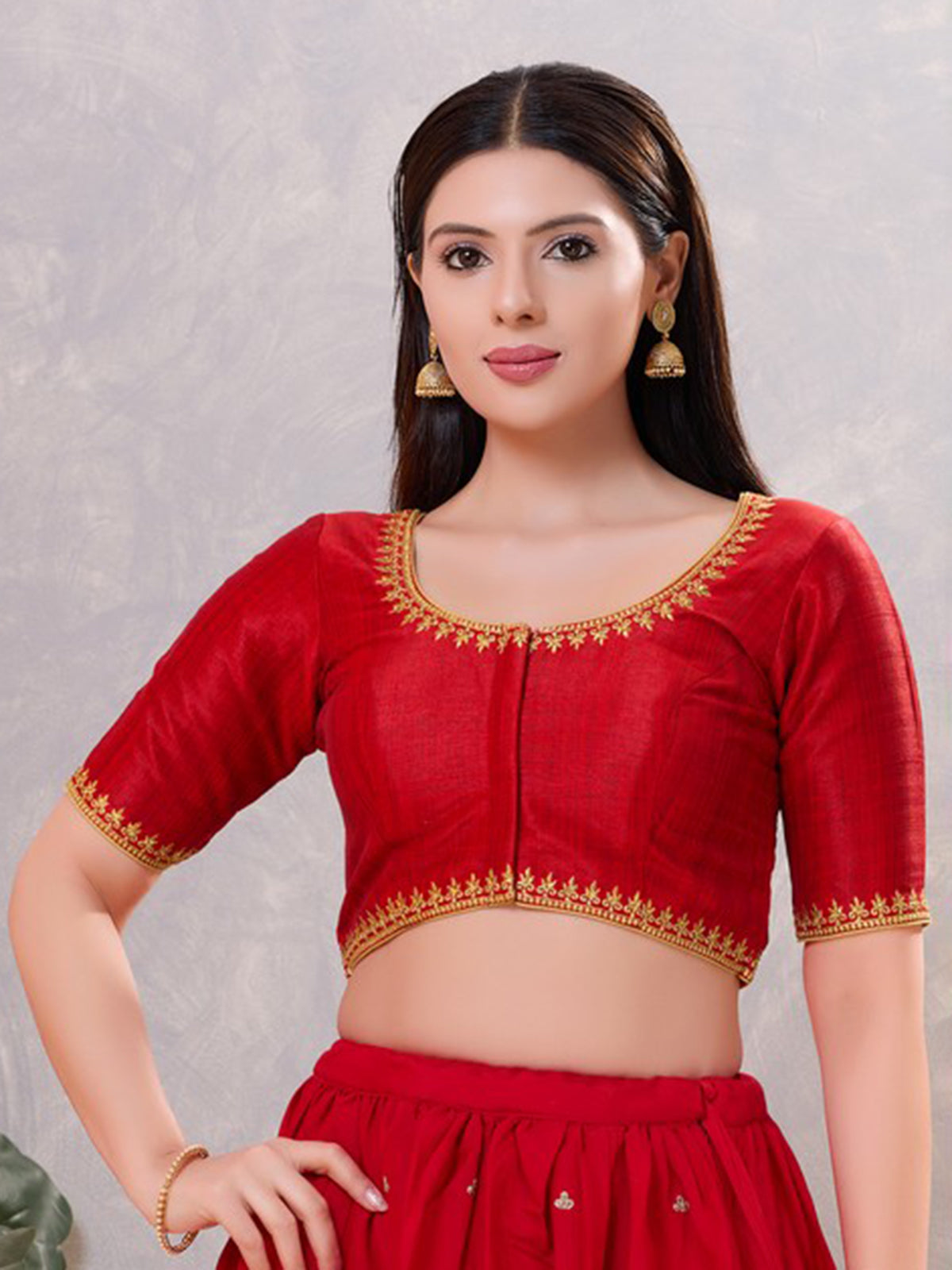 Red silk resham and stone work round neck blouse