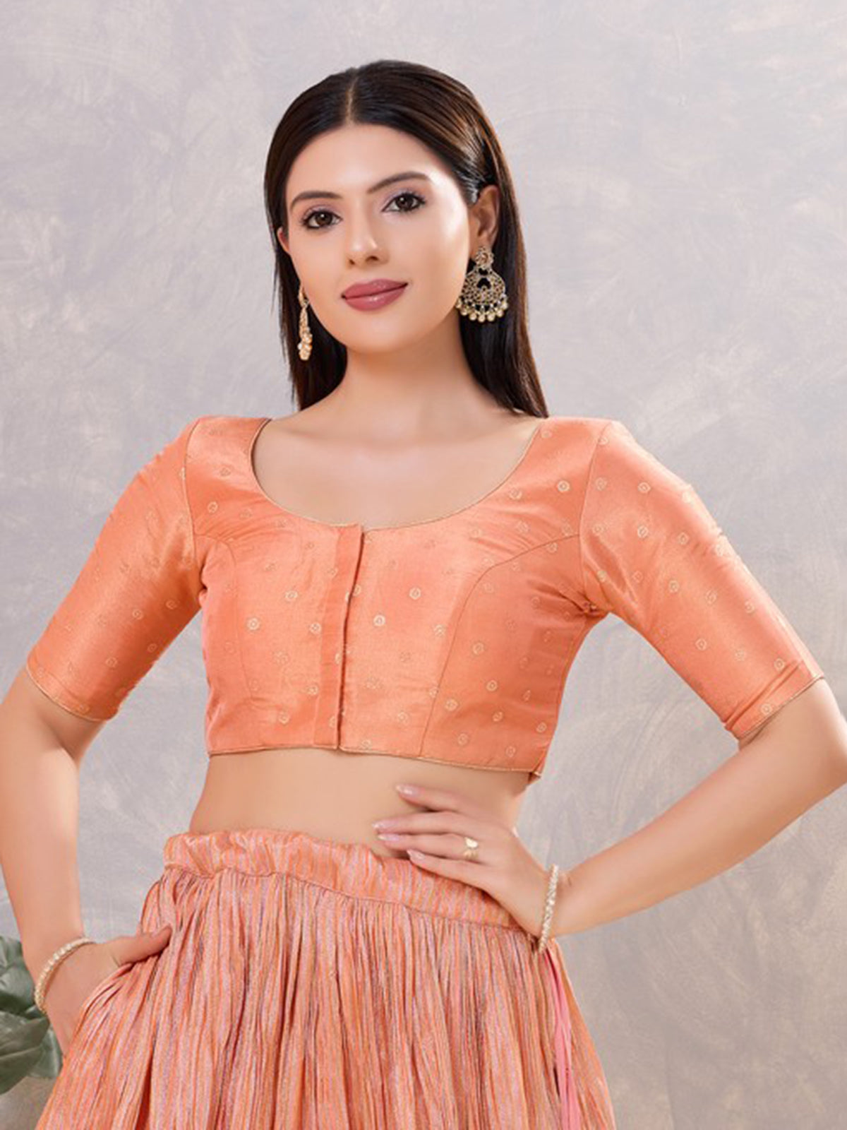 Peach silk zari workand round neck blouse