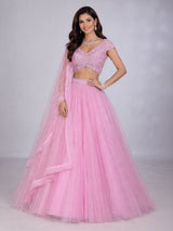 Light pink net lehenga choli with mirror and stone work
