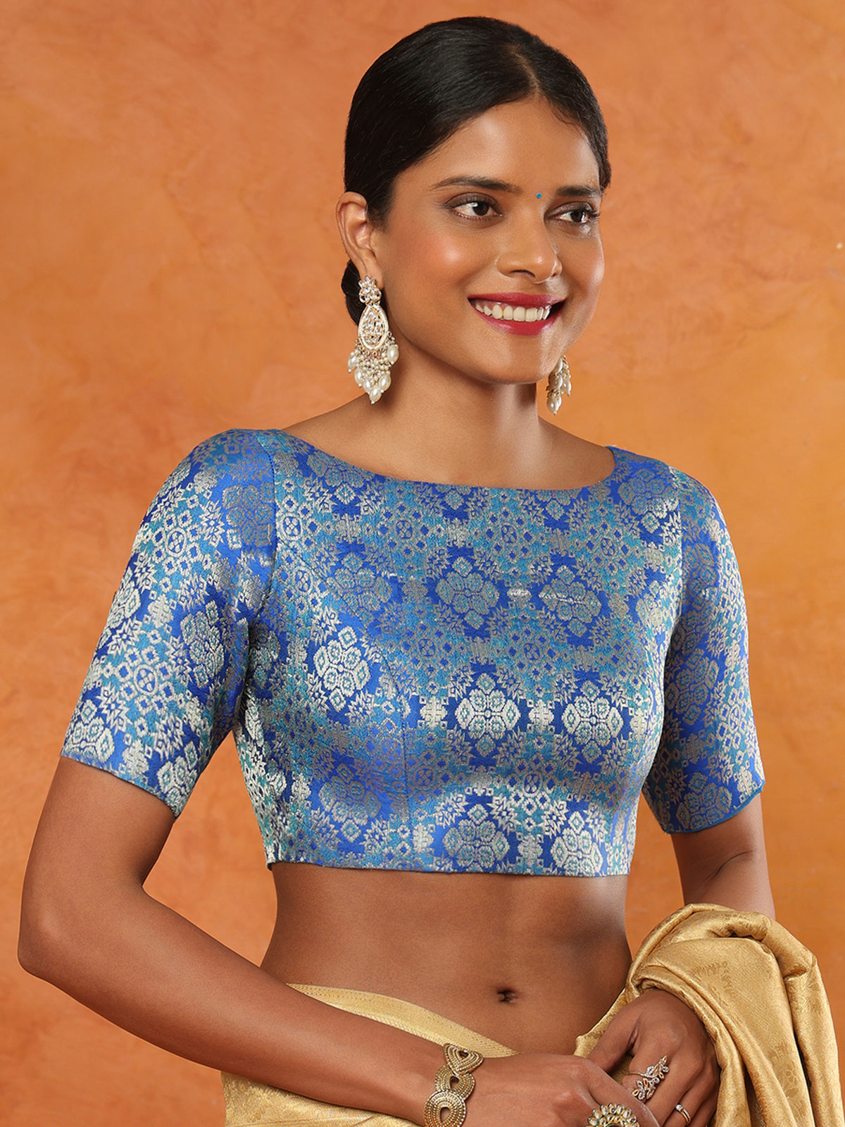 Blue brocade boat neck half sleeve readymade blouse