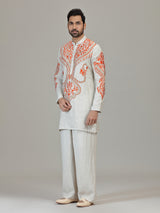Ivory orange embroidered contemporary celebration look