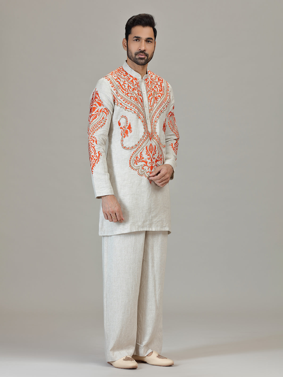 Ivory orange embroidered contemporary celebration look