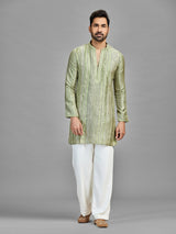 Green banarasi silk mehndi celebration ensemble