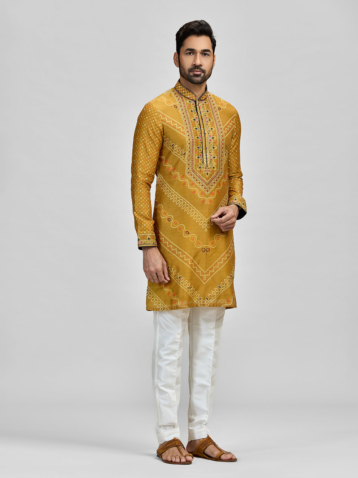 Yellow silk haldi bandhani embroidered kurta ensemble