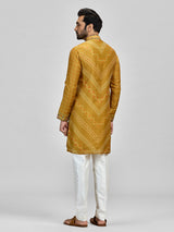 Yellow silk haldi bandhani embroidered kurta ensemble