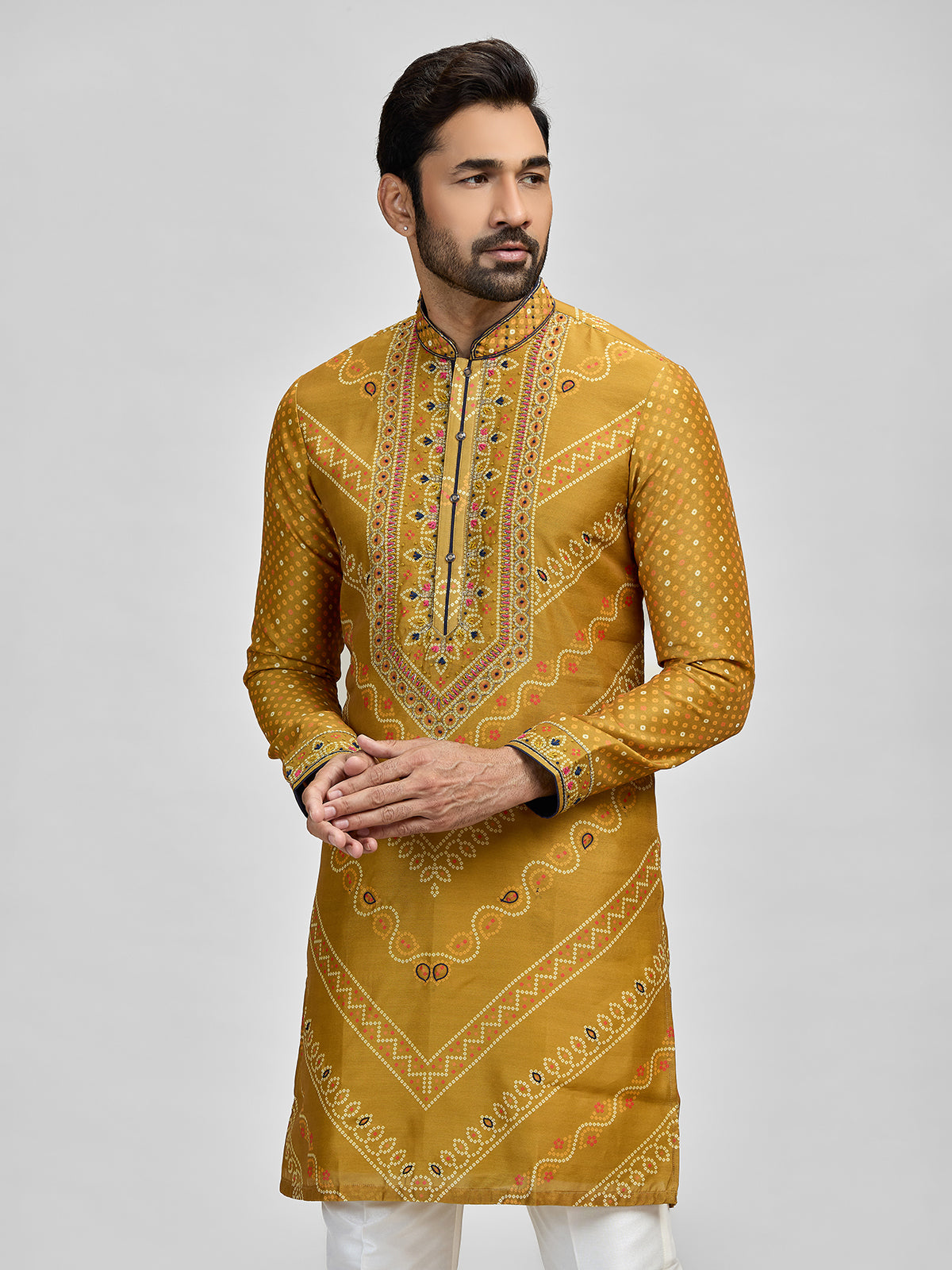 Yellow silk haldi bandhani embroidered kurta ensemble