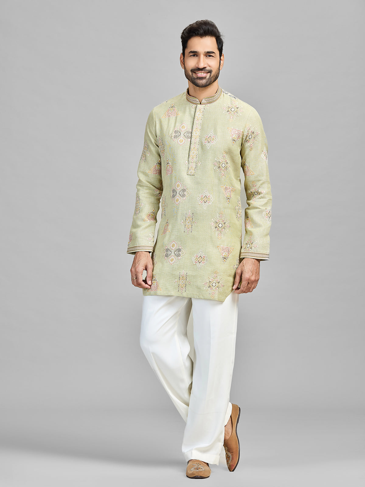 Pista linen cotton embroidered bell bottom kurta suit