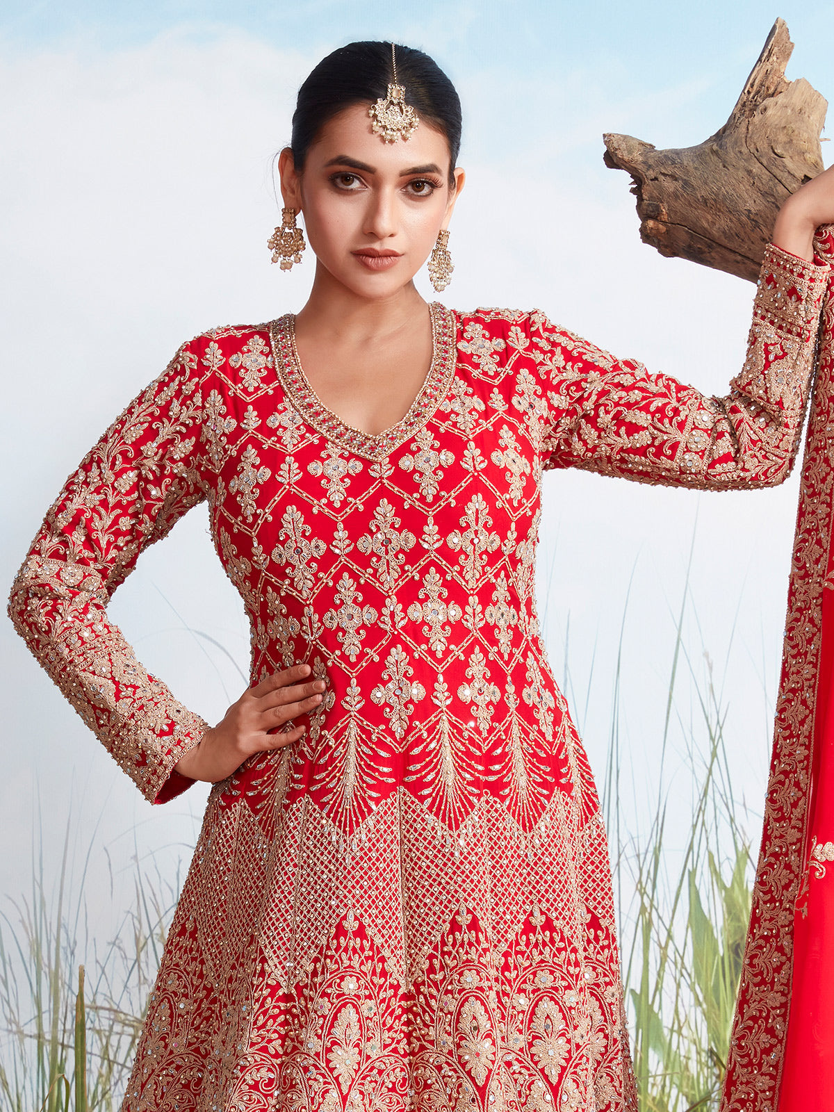Red georgette heavily embellished floor length gown with dupatta