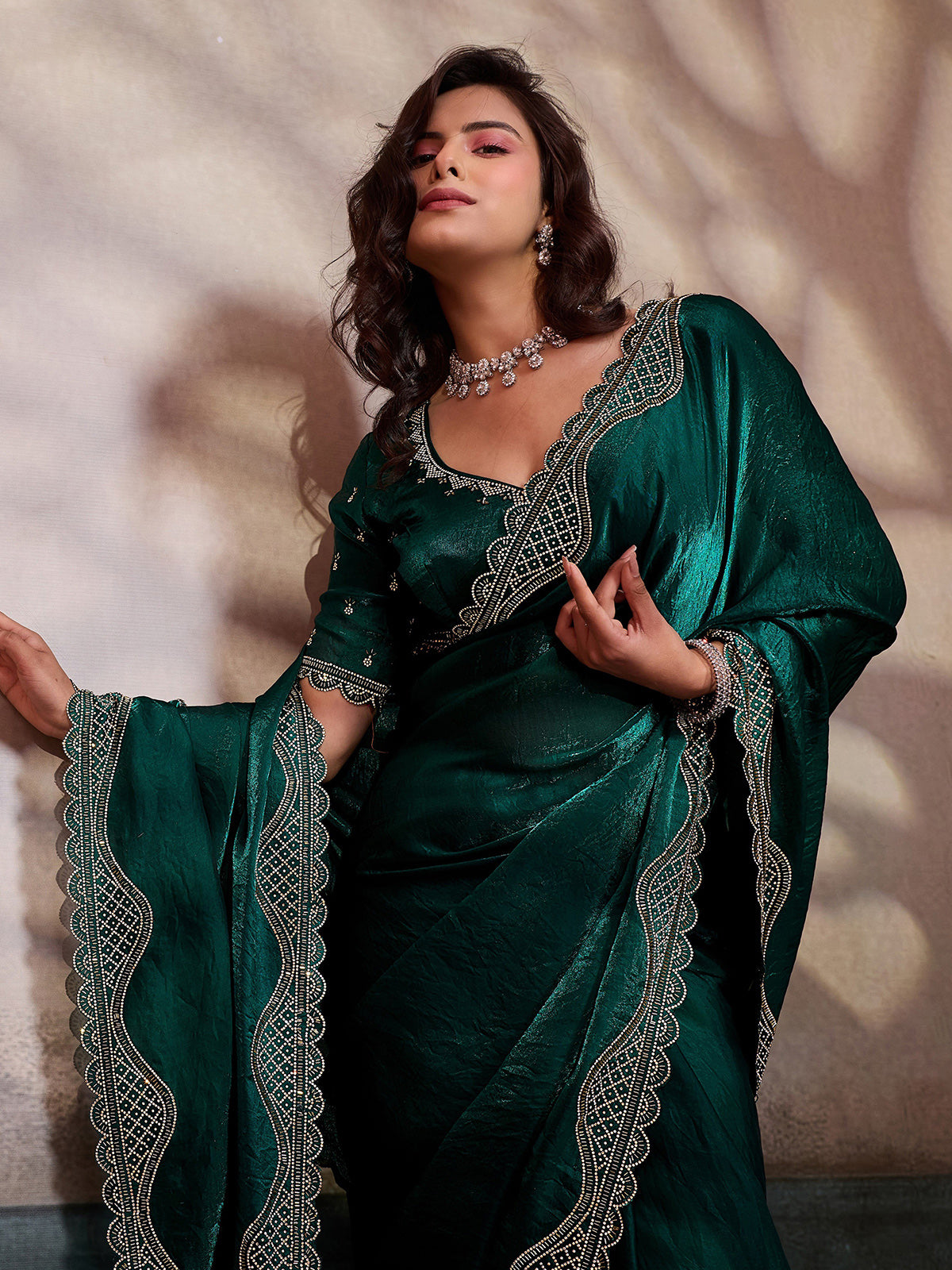 Green wedding wear satin silk saree with stone worked border