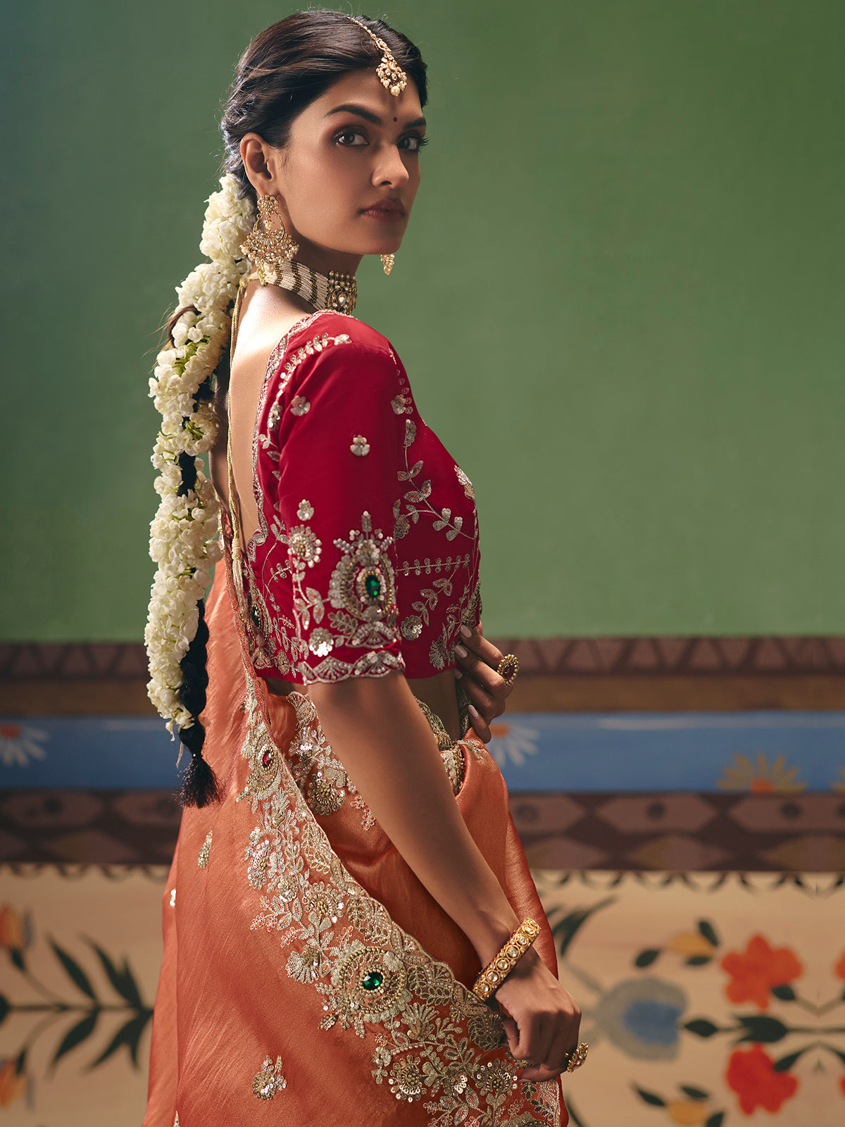 Peach fancy silk saree with rich embellishments