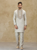 Beige linen kurta suit with colorful embroidery