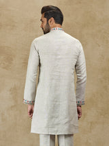 Beige linen kurta with colorful embroidery