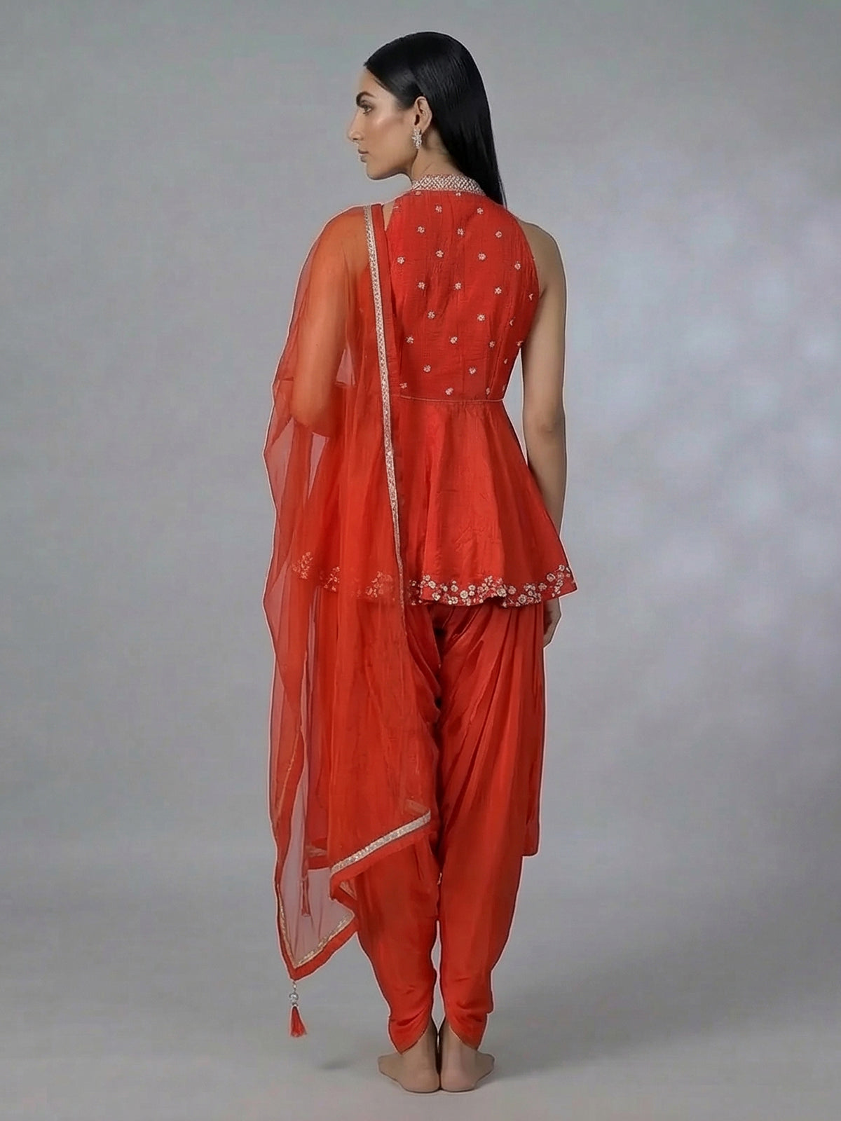 Rust orange designer silk dhoti suit with embellished dupatta