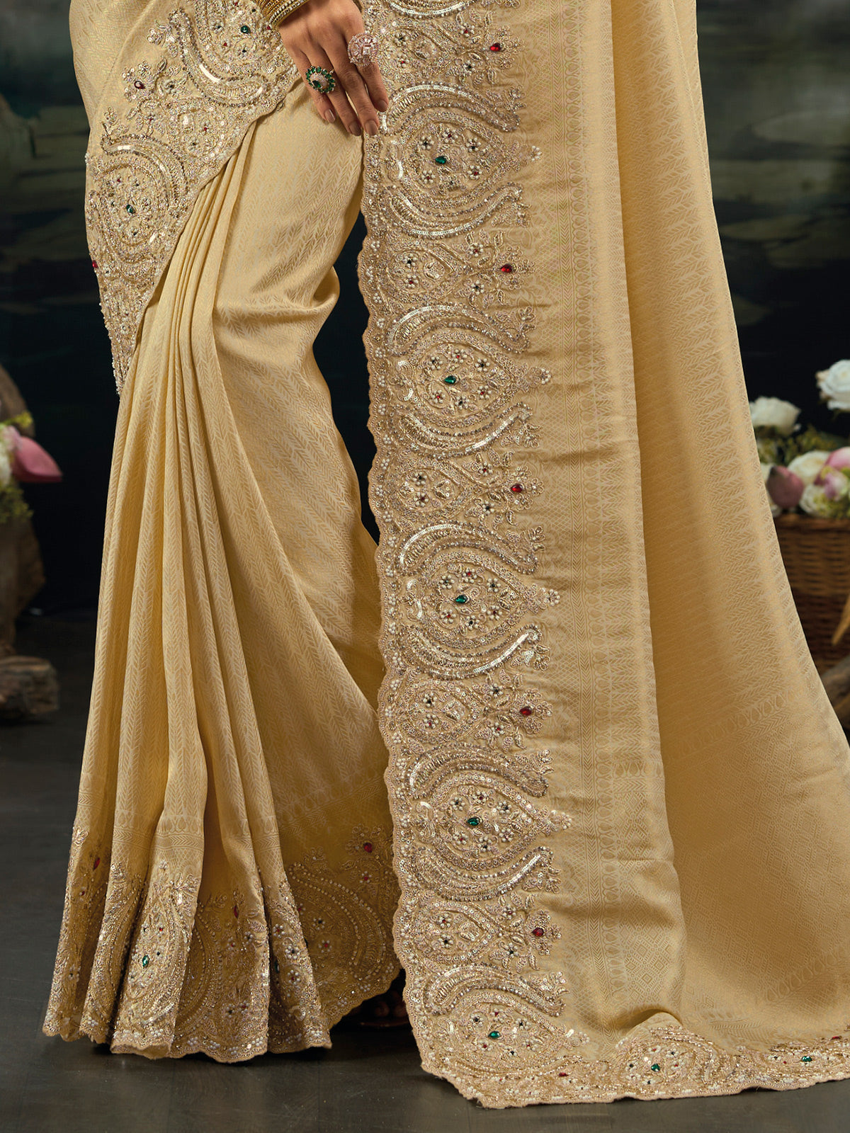 Beige kanjivaram saree with rich embellished border