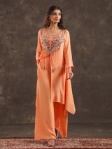 Light peach yoke style palazzo suit with festive embellishments
