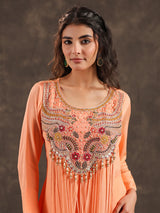 Light peach yoke style palazzo suit with festive embellishments