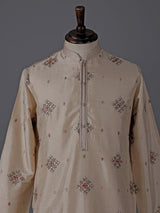 Cream silk embroidered kurta suit with festive sequin detailing