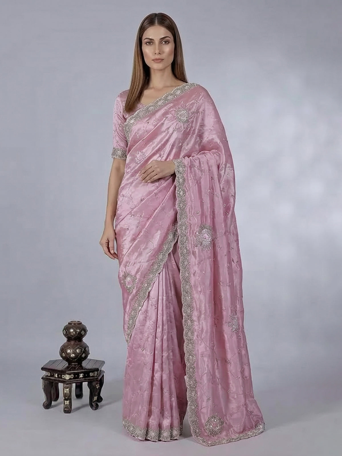 Pink semi tissue silk saree with festive handwork