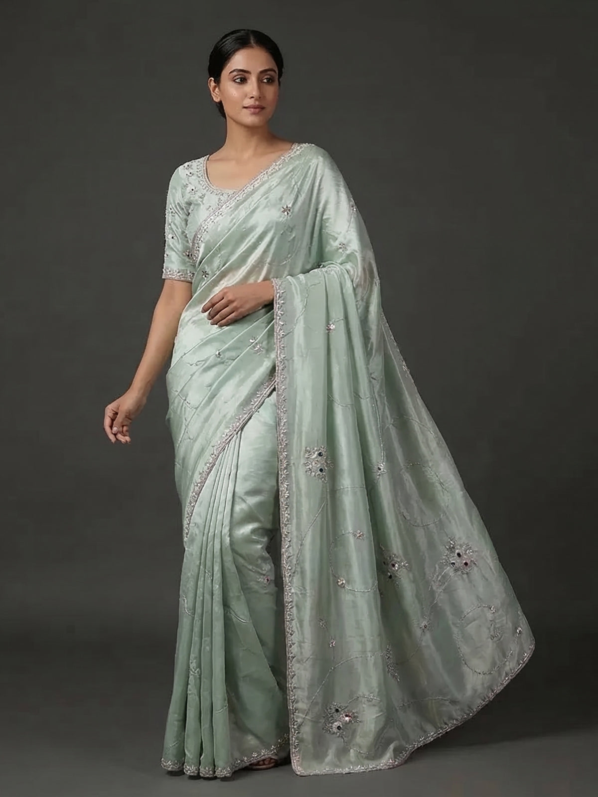 Pista green soft tissue silk saree for reception wear