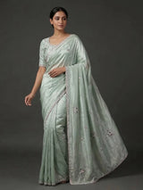 Pista green soft tissue silk saree for reception wear