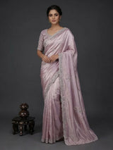 Pastel purple tissue silk saree with stone embellishments