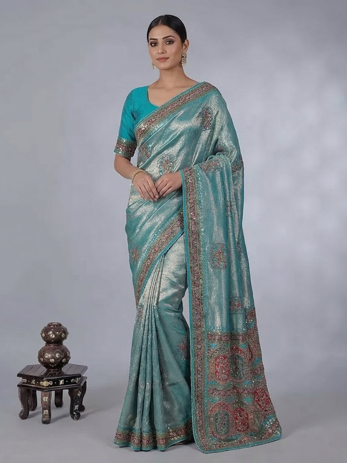 Aqua modal tissue silk saree with festive motifs