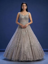 Beige net sleeveless sweetheart designer floor length gown