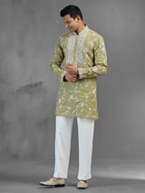 Green linen heritage aari crafted festive kurta suit
