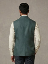 Dark green linen heavily embellished waistcoat with brooch