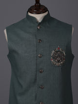 Dark green linen heavily embellished waistcoat with brooch