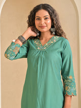 Light green silk embroidered v neck casual kurti