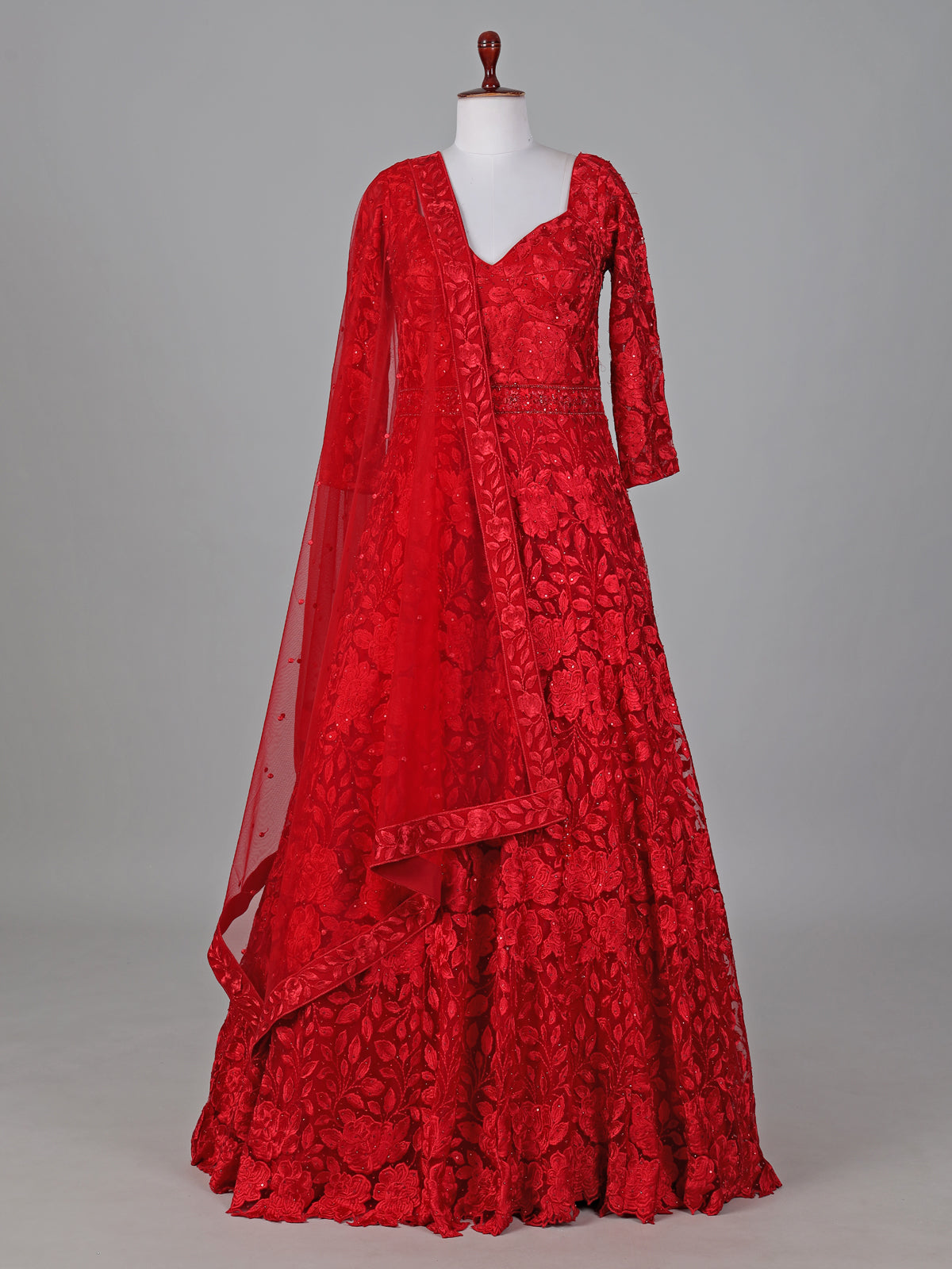 Red net anarkali suit with intricate zardosi elegance