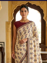 Beige muslin saree with ethnic print