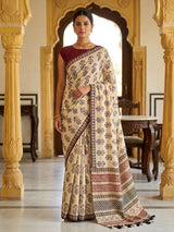 Beige muslin saree with ethnic print