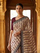Off white muslin saree with ethnic print