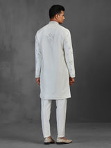 White silk wedding wear kurta suit with mirror work
