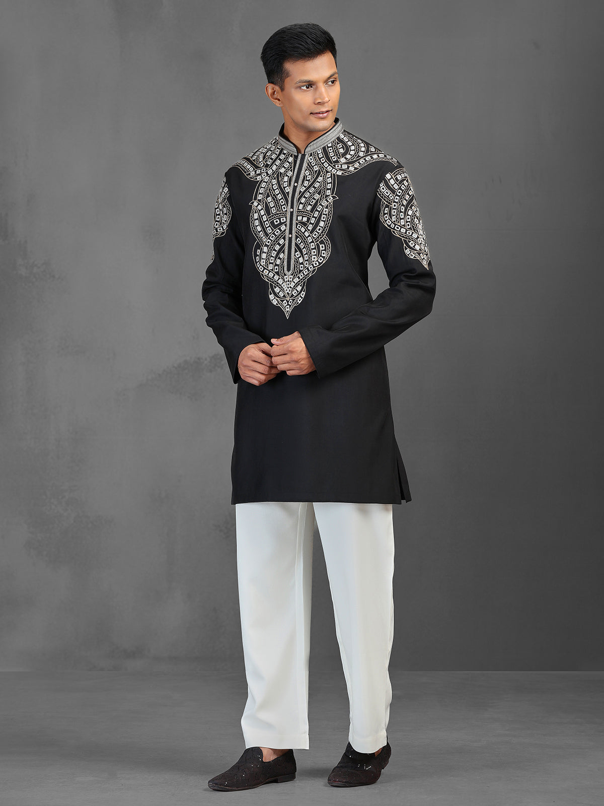 Black art silk kurta suit for a charming wedding look
