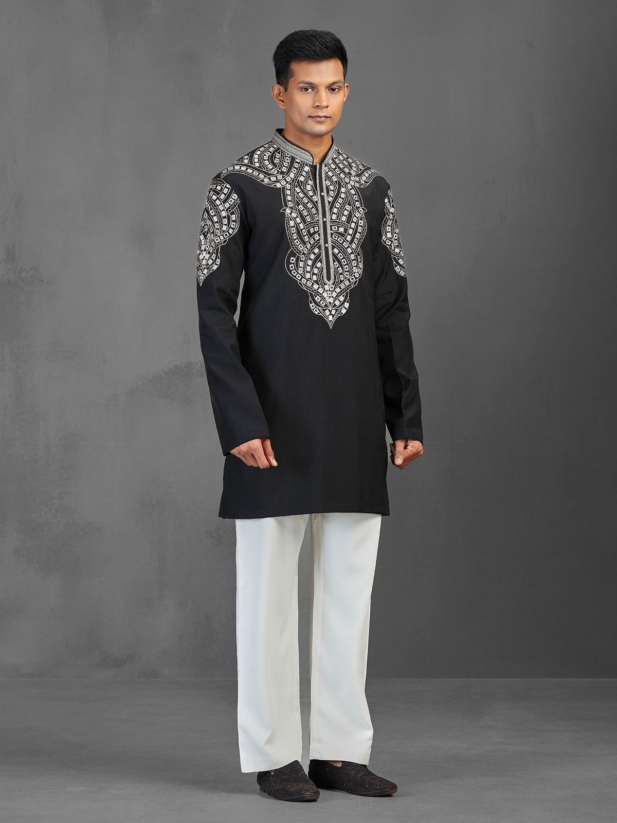 Black art silk kurta suit for a charming wedding look