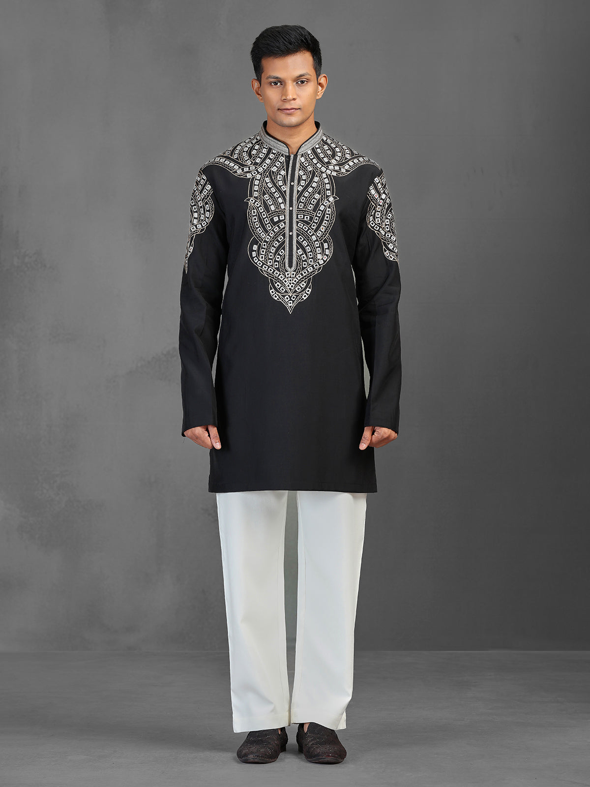 Black art silk kurta suit for a charming wedding look