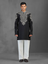 Black art silk kurta suit for a charming wedding look